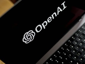 The OpenAI logo on a laptop computer.