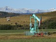 Oilfield pumpjacks, belonging to Crescent Point Energy Corp., producing crude near Longview, Alta.