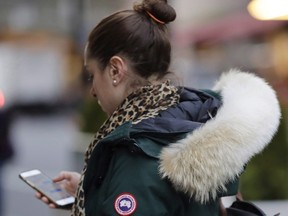 A woman wearing a Canada Goose Holdings Inc. coat in New York.