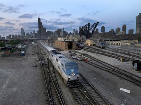 An Amtrak passenger train departing Chicago.