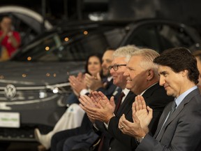 Prime Minister Justin Trudeau and Ontario Premier Doug Ford during an announcement on a Volkswagen AG electric vehicle battery plant at the Elgin County Railway Museum in St. Thomas, Ont.