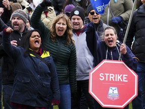 PSAC workers and supporters gather on a picket line in Ottawa on April 19, 2023.