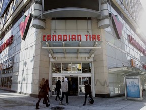 Customers enter a Canadian Tire Corp. store in Toronto.