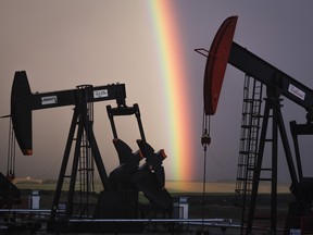 Pumpjacks draw out oil and gas from wells near Calgary.