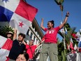 People celebrate the Supreme Court's ruling on the contract with First Quantum Minerals Ltd. and its subsidiary Minera Panama in Panama City.