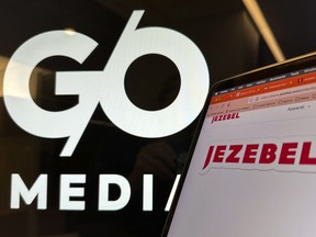 Logos for G/O Media and Jezebel are displayed on monitors in New York on Friday, Nov. 10, 2023. Jezebel, the sharp-edged feminist website that found an impassioned and devoted following at the height of the blogosphere era but ended up struggling with its business model, is shutting down after 16 years, its parent company, G/O Media, announced Thursday.