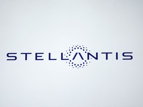 FILE - The Stellantis logo is shown at the North American International Auto Show, Sept. 13, 2023, in Detroit. On Monday, Nov. 13, Stellantis said that it will offer buyout or early retirement packages to about 6,400 nonunion U.S. salaried employees as the auto industry faces what the company is calling challenging market conditions.