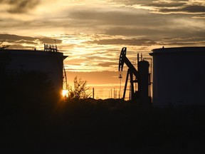 Fitch Ratings says oil and gas companies should prepare for credit downgrades.