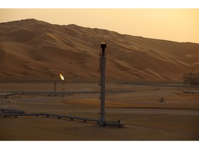 Flames burn off at an oil processing facility in Saudi Aramco's oilfield in the Rub' Al-Khali (Empty Quarter) desert in Shaybah, Saudi Arabia, on Tuesday, Oct. 2, 2018. hotographer: Simon Dawson/Bloomberg
