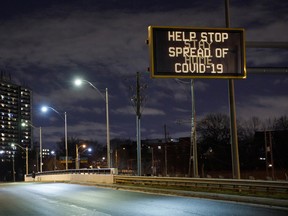 A highway sign encouraging people to stay home in Toronto, in November 2020.
