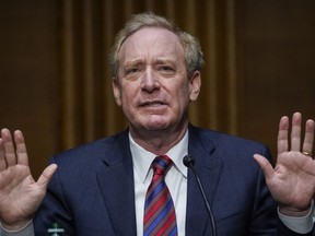 Brad Smith, Microsoft's president and vice-chair, says governments need to move faster to tackle artificial intelligence and implement "safety brakes" around the tech. Smith speaks during a Senate Intelligence Committee hearing on Capitol Hill on Tuesday, Feb. 23, 2021, in Washington.
