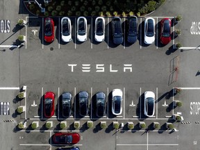 FILE - Tesla vehicles line a parking lot at the company's Fremont, Calif., factory, on Sept. 18, 2023. The Swedish Transport Agency on Monday, Nov. 27, 2023, reportedly was sued by Tesla because the company does not get access to registration plates for new cars.