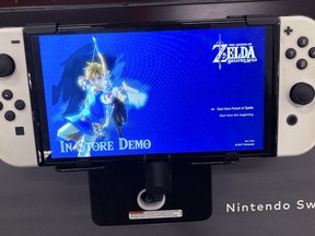 FILE - A Nintendo Switch console is seen at a retail store in Buffalo Grove, Ill., Thursday, Feb. 9, 2022. Nintendo is developing a live-action film based on its hit video game "The Legend of Zelda," the Japanese maker behind the Super Mario franchise said Wednesday, Nov. 8, 2023.