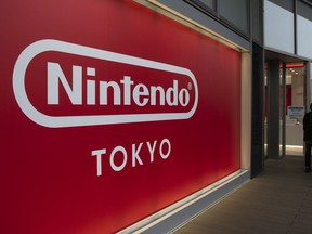 FILE - A Nintendo sign is seen outside Nintendo's official store in the Shibuya district of Tokyo, Thursday, Jan. 23, 2020. Nintendo reported an 18% rise in net profit for the first fiscal half on Tuesday, Nov. 7, 2023, as sales continued to get a boost from its hit Super Mario movie, as well as the popularity of various new video game software.