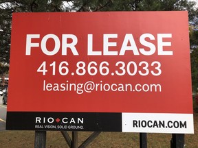 RioCan signage is shown at a strip mall in Mississauga, Ont., Saturday, Oct.24, 2020.&ampnbsp;RioCan Real Estate Investment Trust says millions of fair value losses left the company with a net loss of $73.5 million in its most recent quarter. THE&ampnbsp;CANADIAN PRESS/Richard Buchan