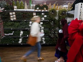 Holiday decorations are displayed at Blackhawk Hardware on Wednesday, Nov. 1, 2023, in Charlotte, N.C. Indeed says Canadian job postings for holiday positions are down 30 per cent from a year ago.