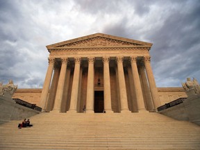 FILE - The U.S. Supreme Court is seen at near sunset in Washington, on Oct. 18, 2018. The Supreme Court is hearing arguments in a challenge to the Securities and Exchange Commission's ability to fight fraud, part of a broader attack on regulatory agencies led by conservative and business interests.