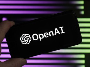 FILE - The logo for OpenAI, the maker of ChatGPT, appears on a mobile phone, in New York, Jan. 31, 2023. Lawmakers in Brazil's southern city of Porto Alegre Brazil have enacted legislation written entirely by artificial intelligence. The experimental ordinance was passed in October and city councilman Ramiro Rosário revealed on Thursday, Nov. 29, 2023, that it was written by a chatbot, sparking objections and raising questions about the role of artificial intelligence in public policy.