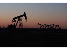 Oil pumpjacks in the Permian Basin oil field in Midland, Texas.