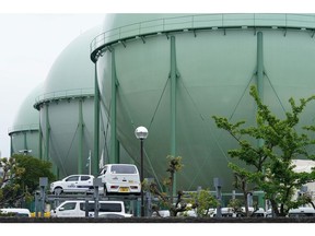 Tokyo Gas Co. storage tanks at the company's Hiranuma facility in Yokohama, Japan, on Wednesday, April 20, 2022. Japan's imports jumped 31% in March from a year ago to a record value, led by crude oil, coal and natural gas, and that will translate into higher power bills in the nation that relies heavily on others for its energy resources. Photographer: Toru Hanai/Bloomberg