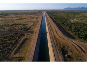 A section of the Central Arizona Project, a series of aqueducts and tunnels designed to bring water from the Colorado River to central and southern Arizona, outside of Santan, Arizona, US on Tuesday, May 9, 2023. The Interior Department is poised to mandate further water cuts on the Colorado River to prevent damage to two of the Southwest's largest hydropower dams in the face of drought, a "dire" scenario the seven river basin states have tried hard to avoid. Photographer: Rebecca Noble/Bloomberg