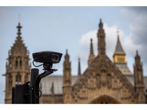 A surveillance camera used to monitor the Ultra Low Emission Zone (ULEZ) zone outside the Houses of Parliament in the Westminster district of London, UK, on Tuesday, Aug. 29, 2023. Every driver in London, as of Tuesday, is now subject to strict pollution rules, completing one of the world's most ambitious vehicle emissions policies and taking the British capital closer to having healthy air. Photographer: Chris J. Ratcliffe/Bloomberg