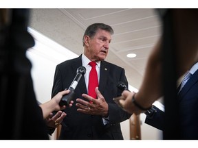Senator Joe Manchin, a Democrat from West Virginia and chairman of the Senate Energy and Natural Resources Committee, speaks to members of the media prior to a hearing in Washington, DC, US, on Thursday, Sept. 7, 2023. The hearing is titled "Examining Recent Advances in Artificial Intelligence and the Department of Energys Role in Ensuring U.S. Competitiveness and Security in Emerging Technologies."