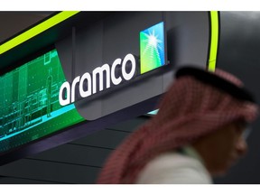 Signage above the Saudi Aramco booth on day two of the Abu Dhabi International Petroleum Exhibition and Conference (ADIPEC) in Abu Dhabi, United Arab Emirates, on Tuesday, Oct. 3, 2023. The annual strategic energy conference runs from Oct 2-5.