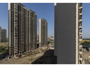Residential buildings under construction at China Evergrande Group's Riverside Palace development in Suzhou, Jiangsu province, China, on Thursday, Nov. 2, 2023.  Source: Bloomberg