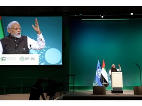 DUBAI, UNITED ARAB EMIRATES - DECEMBER 01: Indian Prime Minister Narendra Modi speaks during day one of the high-level segment of the UNFCCC COP28 Climate Conference at Expo City Dubai on December 01, 2023 in Dubai, United Arab Emirates. The COP28, which is running from November 30 through December 12, brings together stakeholders, including international heads of state and other leaders, scientists, environmentalists, indigenous peoples representatives, activists and others to discuss and agree on the implementation of global measures towards mitigating the effects of climate change.