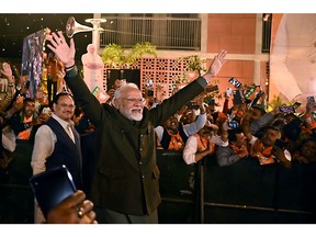 Narendra Modi at the Bhartiya Janata Party (BJP) headquarters in New Delhi on Dec. 3. Photographer: Prakash Singh/Bloomberg