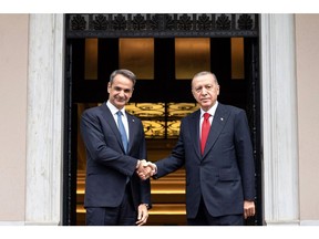 Recep Tayyip Erdogan, right, with Kyriakos Mitsotakis in Athens, Greece, on Dec. 7.