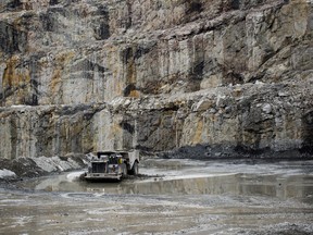 A truck transports Kimberlite ore from an underground mine to a stockpile that will be taken to the processing facility at the Diavik Diamond Mine in the Northwest Territories.