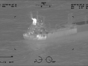 This image provided by the U.S. Coast Guard shows a reported fire aboard the 410-foot cargo vessel Genius Star XI, approximately 200 miles southwest of Dutch Harbor, Alaska on Thursday, Dec. 29, 2023. The large cargo ship with a fire in its hold is being kept 2 miles (3.22 kilometers) offshore of an Alaska port as a precaution while efforts are undertaken to extinguish the flames, the U.S. Coast Guard said Saturday.