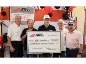ATSG raised more than $317,000 for charity during three golf tournaments in 2023. Pictured (l to r) are ATSG Board member Jeffrey Vorholt, Chairman and CEO Joe Hete, President Mike Berger, Board member Randy Rademacher, and Board member Jeffrey Dominick.