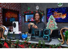 Shade Moore gets ready to go live on Newegg's TikTok channel to discuss deals during the TikTok Shop Holiday Deals promotion. Newegg is offering substantial deals on popular tech products for TikTok users looking for holiday gifts.