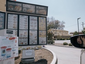 Caelyn Pender, a Bloomberg reporter, tests the Presto Automation drive-thru chatbot at a Del Taco restaurant in Riverside, Calif.