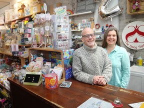 Erin Salisbury and Guy Bagley are photographed at The Swag Sisters' Toy Store in Toronto on Thursday, December 7, 2023.