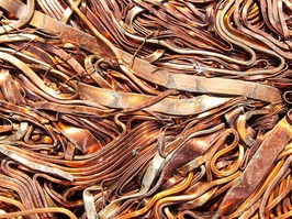 A pressed cube of copper scrap sits ahead of recycling at a plant in Germany.