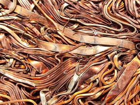 A pressed cube of copper scrap sits ahead of recycling at a plant in Germany.