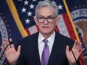 U.S. Federal Reserve Board Chairman Jerome Powell speaks during a news conference in Washington on Wednesday after holding the rate for the third straight meeting.