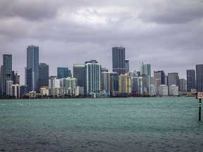 The Miami skyline is viewed from the Rickenbacker Causeway in South Florida, Dec. 15, 2023. South Carolina and Florida were the two fastest-growing states in the U.S., as the South region dominated population gains in 2023, and the U.S. growth rate ticked upward slightly from the depths of the pandemic due to a drop in deaths, according to estimates released Tuesday, Dec. 19 by the U.S. Census Bureau.