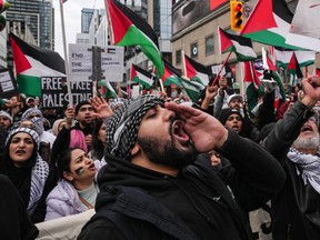 A pro-Palestine march at a Toronto intersection on Oct. 29, 2023.