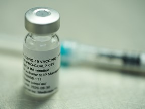 A vial of a plant-derived COVID-19 vaccine candidate, developed by Medicago, in Quebec City.