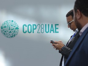Participants attend day eleven of the UNFCCC COP28 Climate Conference as negotiations go into their final phase on Dec. 11 in Dubai, United Arab Emirates.