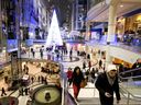 Holiday shoppers at the Eaton Centre in Toronto.