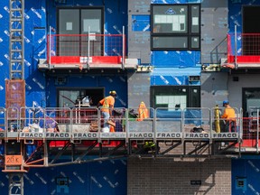 Construction workers on the site of an affordable housing project in the Thornecliffe Park area of ​​Ottawa.