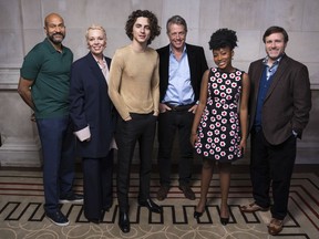 Keegan-Michael Key, from left, Olivia Colman, Timothee Chalamet, Hugh Grant, Calah Lane and director Paul King pose for portrait to promote the film "Wonka" on Wednesday, Nov. 29, 2023 in London.