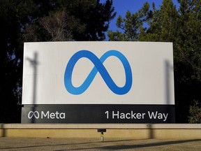 FILE - Meta's logo is seen on a sign, Nov. 9, 2022, at the company's headquarters in Menlo Park, Calif. Facebook and Instagram fail to protect underage users from exposure to child sexual abuse material and let adults solicit pornographic imagery from them, New Mexico's attorney general alleges in a lawsuit filed Tuesday, Dec. 5, 2023, that follows an undercover online investigation into Meta's social media platforms.