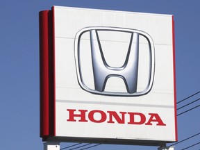FILE - The logo of Honda Motor Co., is seen in Yokohama, near Tokyo on Dec. 15, 2021. Honda Motor's American arm is recalling more than 2.5 million vehicles in the U.S. due to a fuel pump defect that can increase risks of engine failure or stalling while driving.